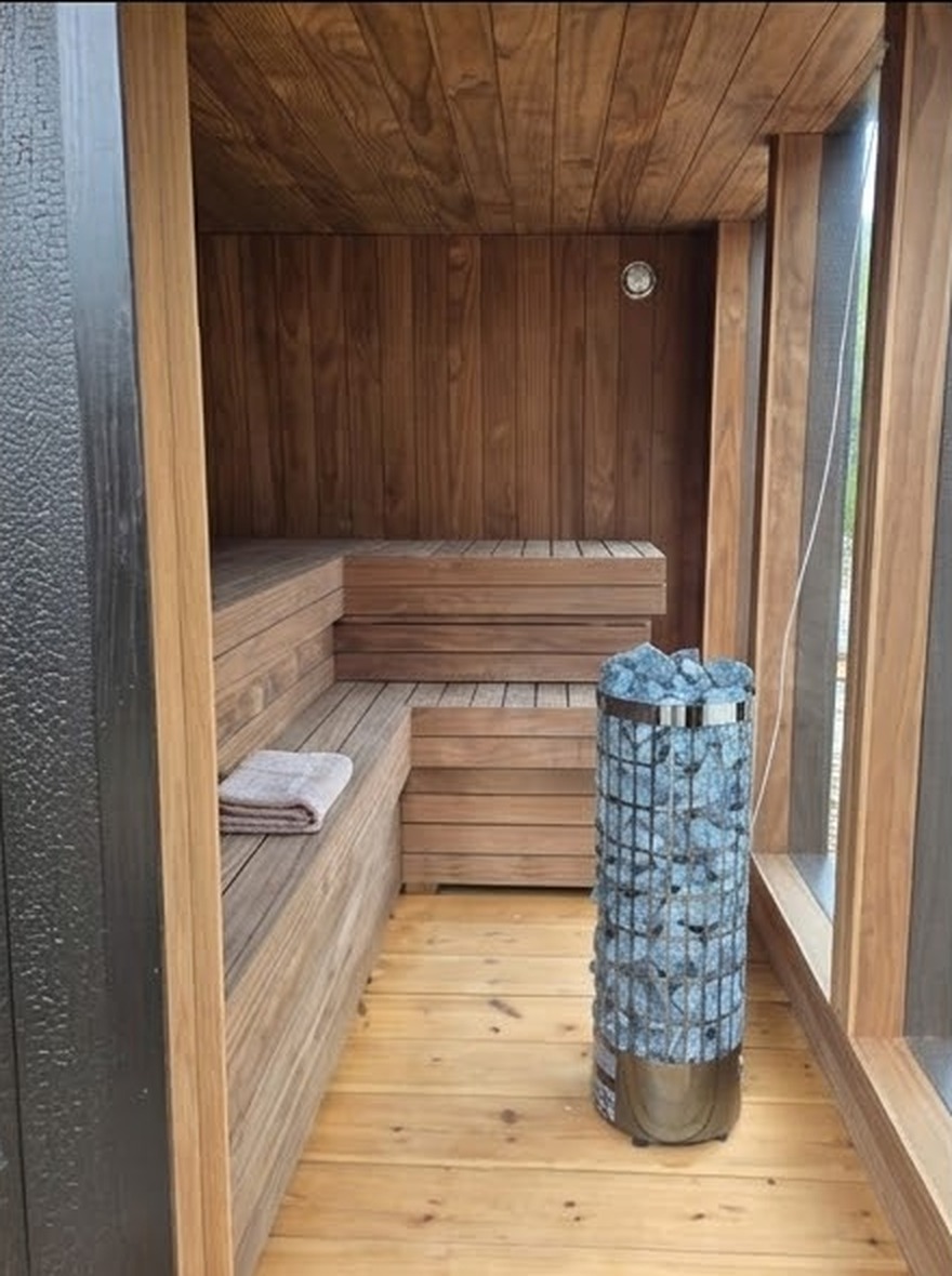 Timber benches and sauna heater